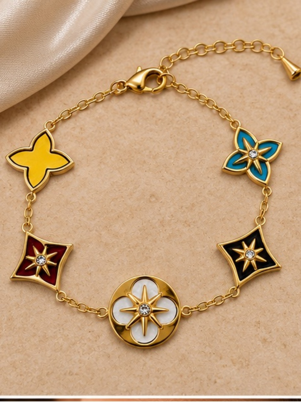 Luxe Gold Bracelet with Yellow, Teal, Red, Black & White Enamel Motifs